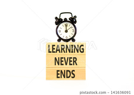 Learning never ends words symbol. Concept words Learning never ends on beautiful wooden blocks. Beautiful white background. Business support motivational and learning never ends concept. Copy space. Learning never ends words symbol. Concept words Learning never ends on beautiful wooden blocks. Beautiful white background. Business support motivational and learning never ends concept. Copy space. 141636091