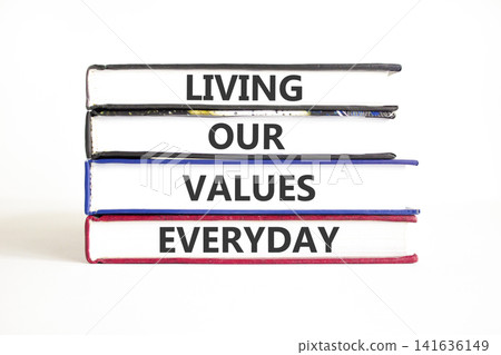 Living our values everyday words symbol. Concept words Living our values everyday on beautiful books. Beautiful white background. Business living our values everyday concept. Copy space. Living our values everyday words symbol. Concept words Living our values everyday on beautiful books. Beautiful white background. Business living our values everyday concept. Copy space. 141636149