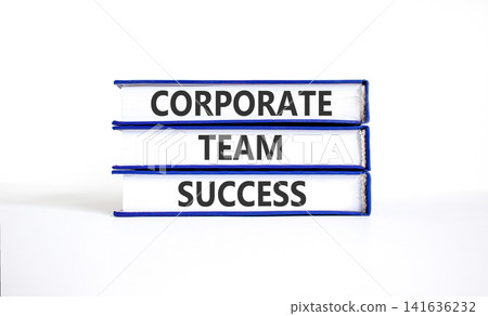 Corporate team success words symbol. Concept words Corporate team success on beautiful books. Beautiful white background. Business corporate team success concept. Copy space. 141636232