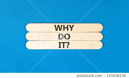 Why do it words symbol. Concept words Why do it on beautiful wooden sticks. Beautiful blue background. Business support motivational and Why do it concept. Copy space. Why do it words symbol. Concept words Why do it on beautiful wooden sticks. Beautiful blue background. Business support motivational and Why do it concept. Copy space. 141636236