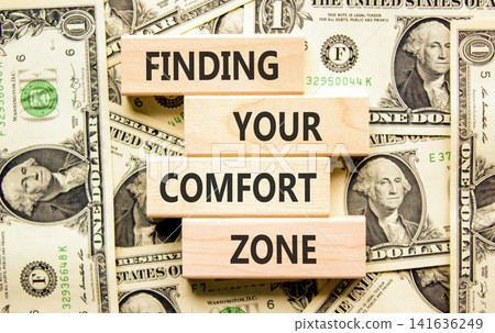 Finding your comfort zone symbol. Concept words Finding your comfort zone on beautiful wooden blocks. Beautiful dollar bills background. Psychological finding your comfort zone concept. Copy space. Finding your comfort zone symbol. Concept words Finding your comfort zone on beautiful wooden blocks. Beautiful dollar bills background. Psychological finding your comfort zone concept. Copy space. 141636249