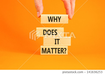 Why does it matter words symbol. Concept words Why does it matter on beautiful wooden blocks. Beautiful orange background. Businessman hand. Business support why does it matter concept. Copy space. Why does it matter words symbol. Concept words Why does it matter on beautiful wooden blocks. Beautiful orange background. Businessman hand. Business support why does it matter concept. Copy space. 141636253