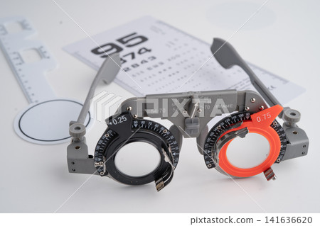 Ophthalmic trial frames to visual acuity eye test. 141636620
