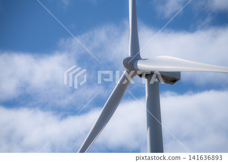 Wind energy and sustainable power generation with wind turbines, Eco-friendly solutions for renewable resources. Wind power farm and sustainable development of renewable energy, green technology. Wind energy and sustainable power generation with wind turbines, Eco-friendly solutions for renewable resources. Wind power farm and sustainable development of renewable energy, green technology. 141636893