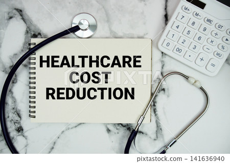 Healthcare Cost Reduction text written on notepad with stethoscope and calculator on marble background Healthcare Cost Reduction text written on notepad with stethoscope and calculator on marble background 141636940