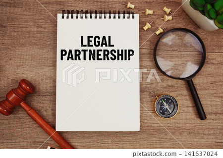 Fair Labor Standards Act message written on notepad with wood gavel and magnifying glass flat lay on wooden background Fair Labor Standards Act message written on notepad with wood gavel and magnifying glass flat lay on wooden background 141637024