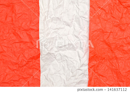vertical white stripe of crumpled paper between orange parts vertical white stripe of crumpled paper between orange parts 141637112