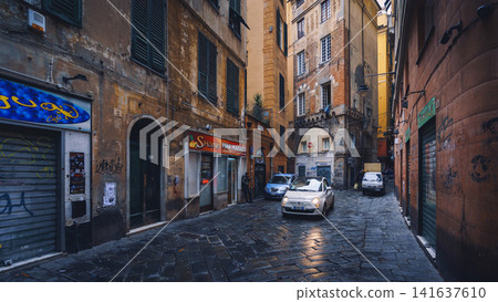 GENOA, ITALY - NOVEMBER 04, 2018 - Narrow streets of the old city GENOA, ITALY - NOVEMBER 04, 2018 - Narrow streets of the old city 141637610