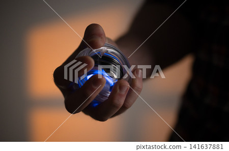Man Rotating A Gyroball Trainer 141637881