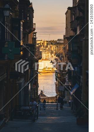 VALLETTA, MALTA - NOVEMBER 12, 2018 - Hilly ancient streets of the city VALLETTA, MALTA - NOVEMBER 12, 2018 - Hilly ancient streets of the city 141638060