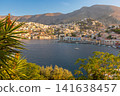 Panoramic View of Symi Harbor and Hillside Town on Symi Island in Greece 141638457
