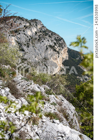 Climbing Garden Placca D Argento At Forte San Marco: Blossoming Trees Framing Cliffside Route In Spring Climbing Garden Placca D Argento At Forte San Marco: Blossoming Trees Framing Cliffside Route In Spring 141638998