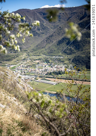 Adige River Valley And Dolci Village Viewed From Placca Del Forte San Marco: Panoramic Spring Landscape Near Lake Garda Adige River Valley And Dolci Village Viewed From Placca Del Forte San Marco: Panoramic Spring Landscape Near Lake Garda 141639051