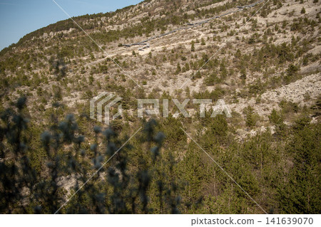 Dinosaur Footprints Trail With Staircase On Rocky Slope: Paleontological Site With Jurassic Tracks Near Mori And Rovereto Near Lake Garda In Trentino Italy 141639070
