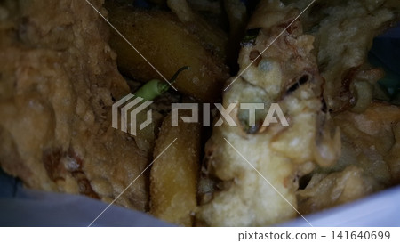 Close up shot of delicious fried food. Fried food is a typical Indonesian food. Close up shot of delicious fried food. Fried food is a typical Indonesian food. 141640699