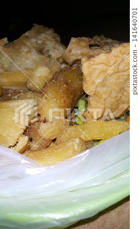 Close up shot of delicious fried food. Fried food is a typical Indonesian food. Close up shot of delicious fried food. Fried food is a typical Indonesian food. 141640701