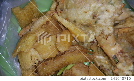 Close up shot of delicious fried food. Fried food is a typical Indonesian food. Close up shot of delicious fried food. Fried food is a typical Indonesian food. 141640710