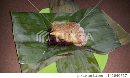 Traditional Indonesian food consists of serabi, lupis, and injin. Traditional Indonesian food consists of serabi, lupis, and injin. 141640737