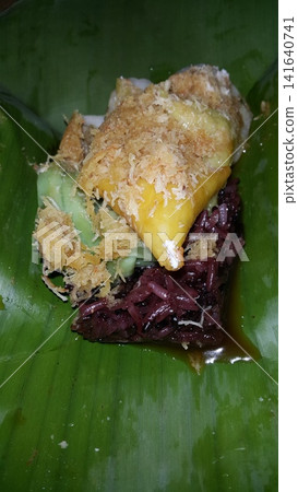 Traditional Indonesian food consists of serabi, lupis, and injin. Traditional Indonesian food consists of serabi, lupis, and injin. 141640741