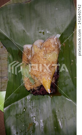 Traditional Indonesian food consists of serabi, lupis, and injin. Traditional Indonesian food consists of serabi, lupis, and injin. 141640742