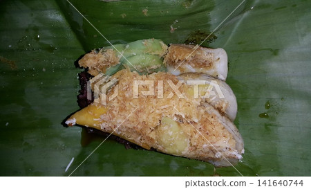Traditional Indonesian food consists of serabi, lupis, and injin. Traditional Indonesian food consists of serabi, lupis, and injin. 141640744