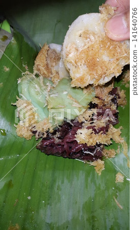 Shot of Serabi which is a traditional market snack originating from Indonesia. Shot of Serabi which is a traditional market snack originating from Indonesia. 141640766