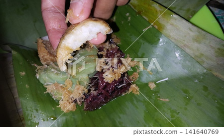 Shot of Serabi which is a traditional market snack originating from Indonesia. Shot of Serabi which is a traditional market snack originating from Indonesia. 141640769