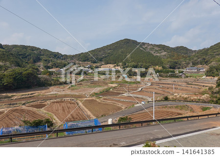 Hirado Island: A mountain village with terraced fields. Hirado Island: A mountain village with terraced fields. 141641385