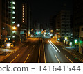 The national highway at night, with trails of light still visible. 141641544