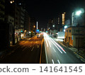 Light trails of cars on the road at night 141641545