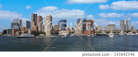 Boston skyline with passengers boats sailing on the foreground, USA Boston skyline with passengers boats sailing on the foreground, USA 141642546