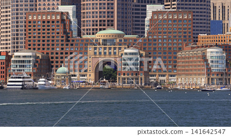 Boston skyline detail With Rowes Wharf on the waterfront promenade, USA Boston skyline detail With Rowes Wharf on the waterfront promenade, USA 141642547