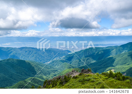 A spectacular view from Ōgatō: Lush summer mountain scenery of Shinshu. A spectacular view from Ōgatō: Lush summer mountain scenery of Shinshu. 141642678