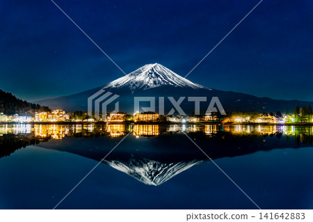Mount Fuji at night: The inverted reflection of Mount Fuji in Lake Kawaguchi Mount Fuji at night: The inverted reflection of Mount Fuji in Lake Kawaguchi 141642883