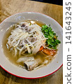 Kuay Teow, a delicious-looking authentic Thai rice noodle dish with smooth noodles in a clear broth. 141643245
