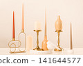 Candles in holders and ceramic bird on light background 141644577