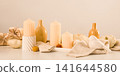 Candles, vases and sweater on beige background, space for text 141644580
