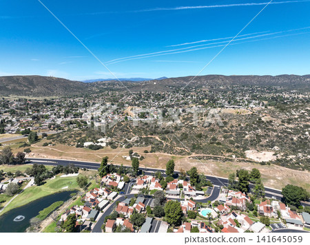 Aerial view of Ramona neighborhood with mountain, valley and golf course Aerial view of Ramona neighborhood with mountain, valley and golf course 141645059