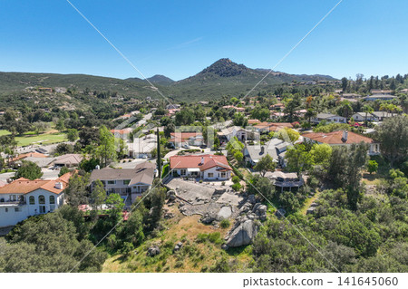 Aerial view of Ramona neighborhood with mountain, valley and golf course Aerial view of Ramona neighborhood with mountain, valley and golf course 141645060