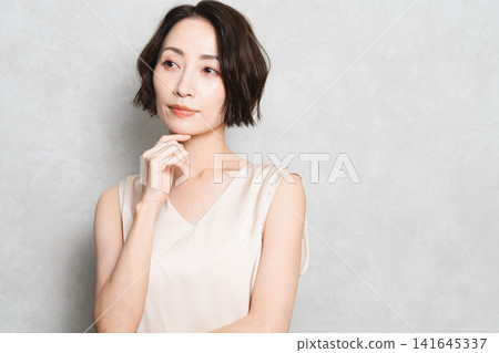 Posing short-haired woman beauty image Posing short-haired woman beauty image 141645337
