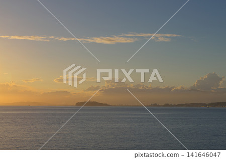 Enoshima Island as seen from Morito Beach in Hayama at dusk - a natural landscape Enoshima Island as seen from Morito Beach in Hayama at dusk - a natural landscape 141646047