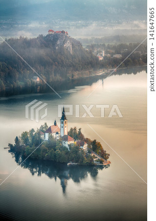 Sunrise over popular tourist destination Bled lake. Sunrise over popular tourist destination Bled lake. 141647665