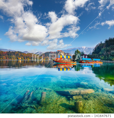 Sunny day view on popular tourist destination Bled lake. Sunny day view on popular tourist destination Bled lake. 141647671