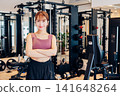 Young female gym instructor 141648264