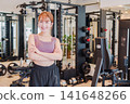 Young female gym instructor 141648266