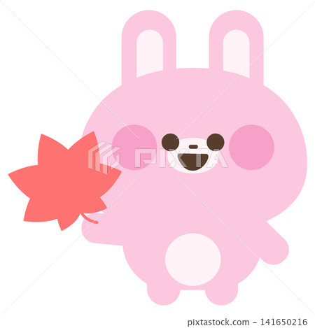 A rabbit looking happy with a maple leaf in its hand. A rabbit looking happy with a maple leaf in its hand. 141650216