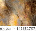 A brown, rock-like textured background painted with acrylics. 141651757