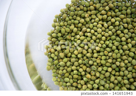Sansho pepper being blanched to remove bitterness Sansho pepper being blanched to remove bitterness 141651943