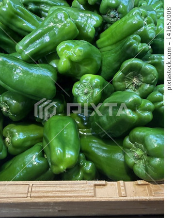 Fresh bell peppers are lined up as ingredients. Fresh bell peppers are lined up as ingredients. 141652008