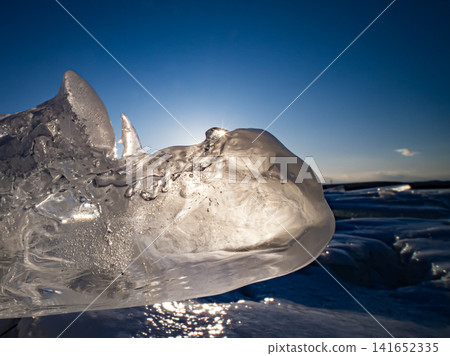 Ice floes and the setting sun on Otsu Beach Ice floes and the setting sun on Otsu Beach 141652335